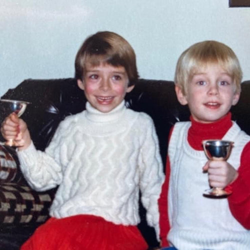 Mister butcher founders holding silver goblets when they were children growing up in British Columbia