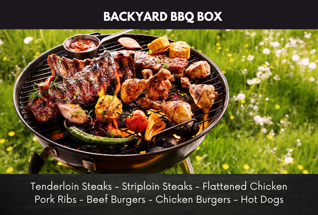 Titled “backyard bbq box”, a grill showing a variety of beef, chicken and roasted vegetables against a grassy background