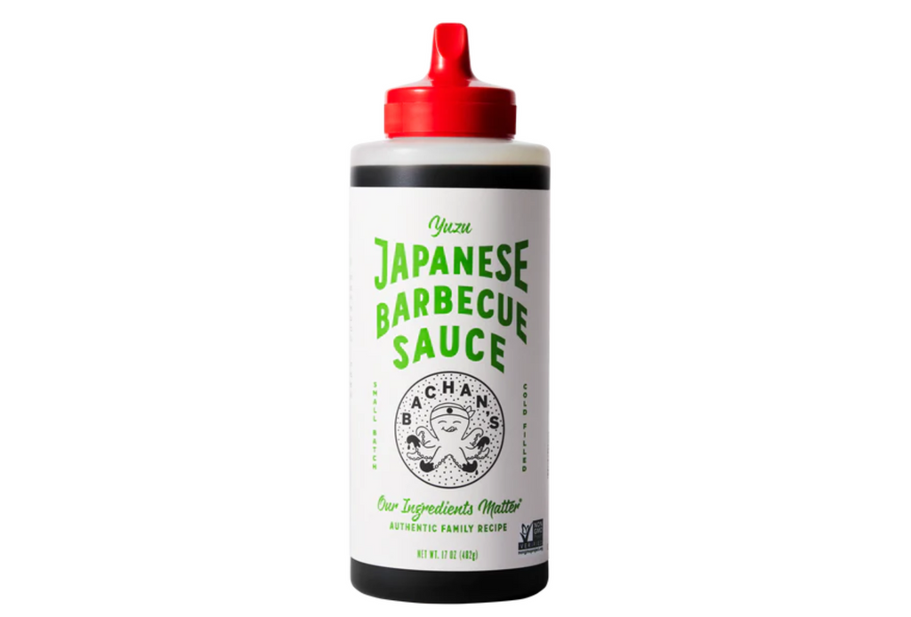 A bottle of Bachan’s Yuzu BBQ sauce on a white background